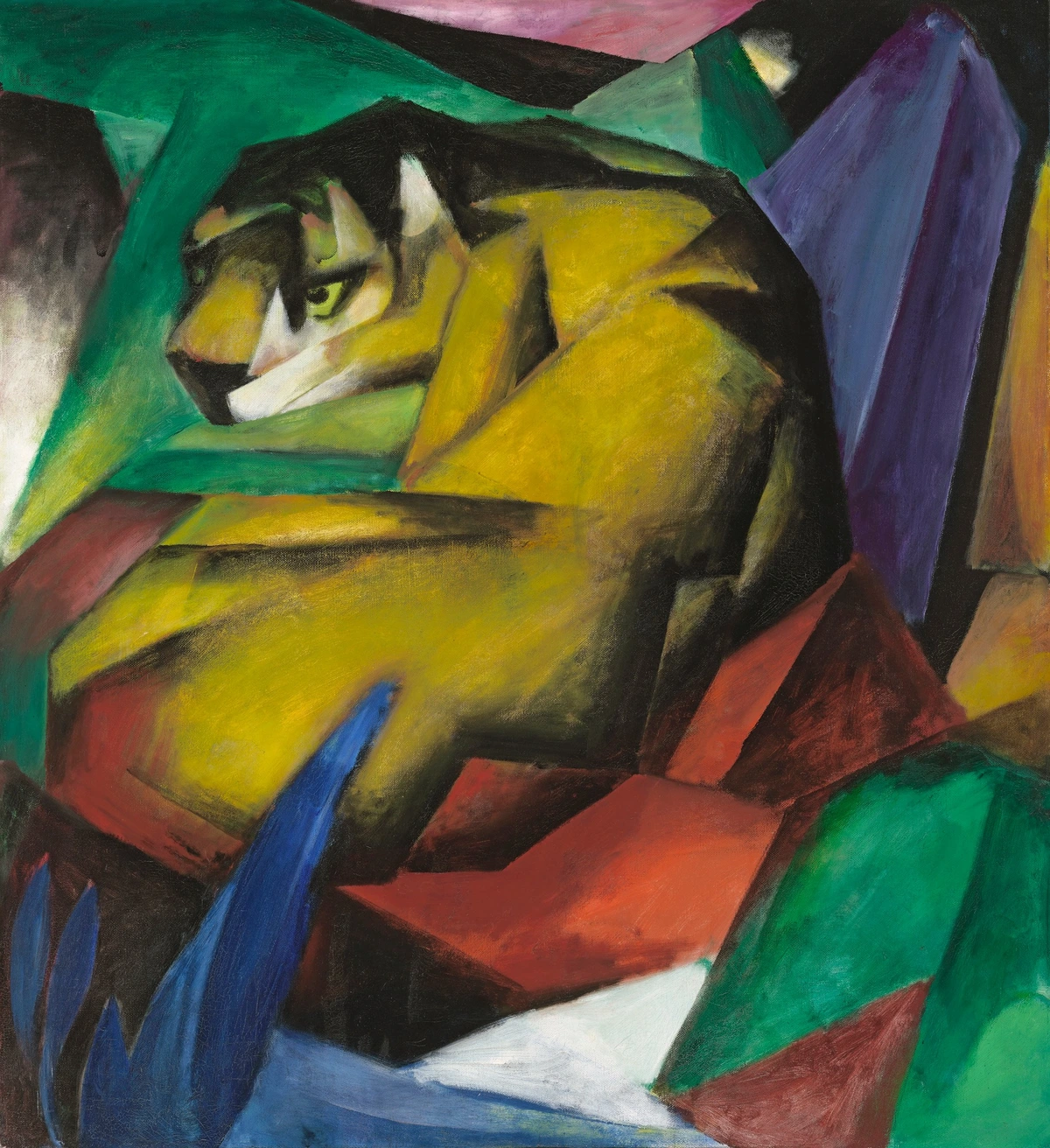 Franz Marc’s Tiger shows a crouching tiger with a turned head, rendered in sharp, faceted yellow forms. The animal blends with its geometric surroundings, creating a powerful abstract composition.