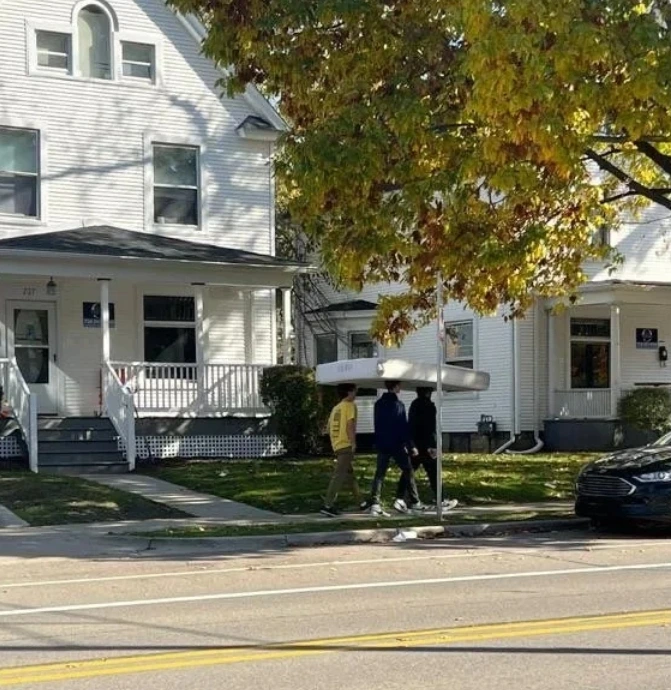 Just saw three undergrads in lockstep carrying a mattress on their heads like ants