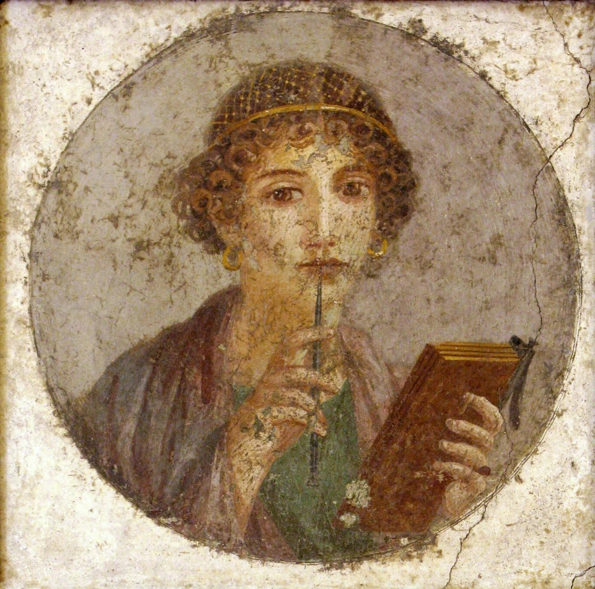 Fresco of young woman looking thoughtful and holding stylus for inscribing onto wax tablets that she also holds
