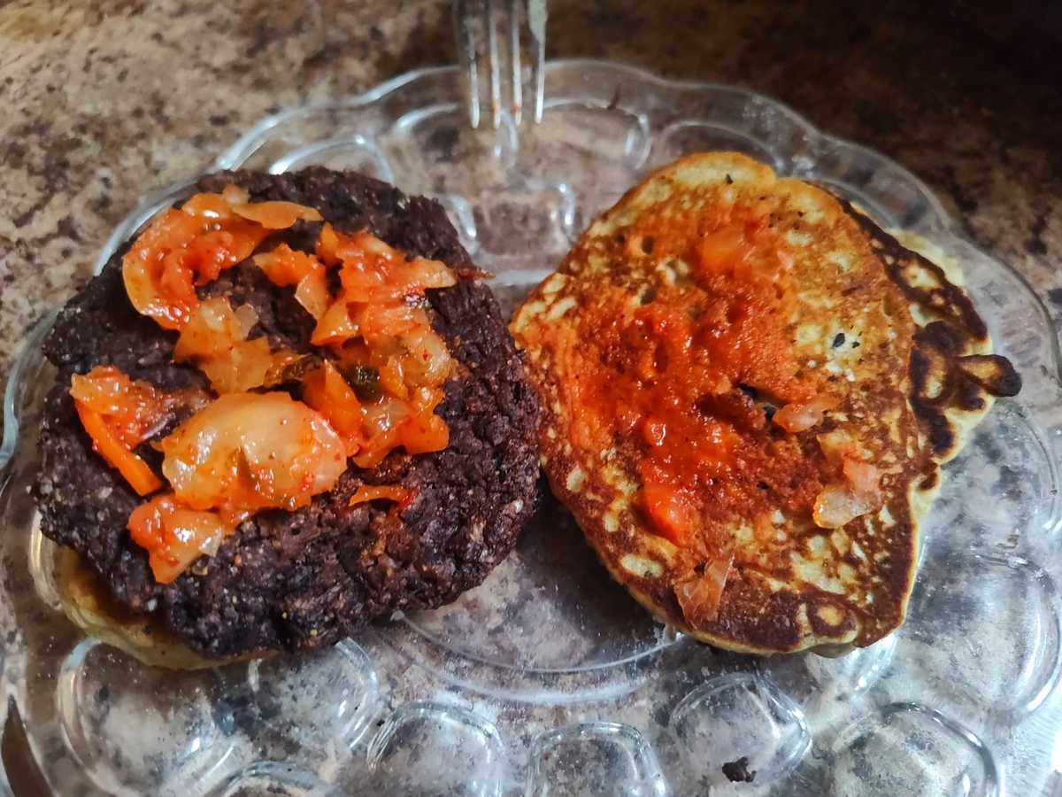 Very simple bean burger with kimchi, using pancakes instead of buns