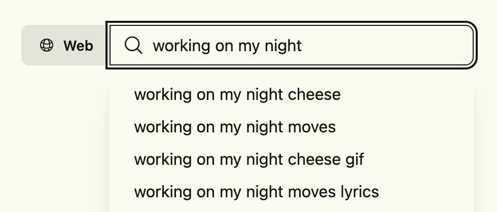 Search box where the user has entered "working on my night," and "cheese" is the first autocomplete result. "moves" is second, followed by "cheese gif," then "moves lyrics."