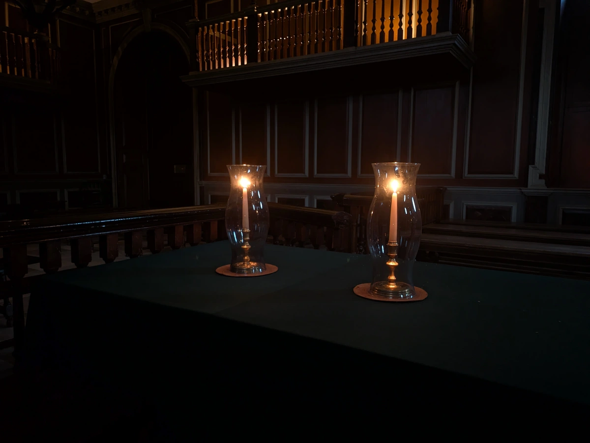 The Attorney General's table for Cry Witch! at Colonial Williamsburg in the courtroom at the Capitol
