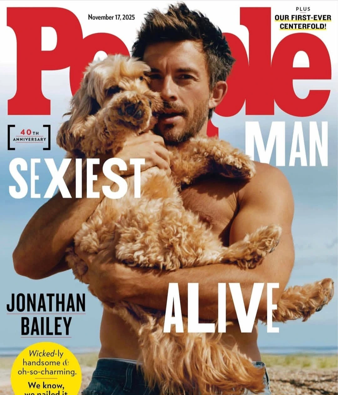 Magazine cover of man holdibg dog with text People Man Sexiest Jonathan Bailey Alive
