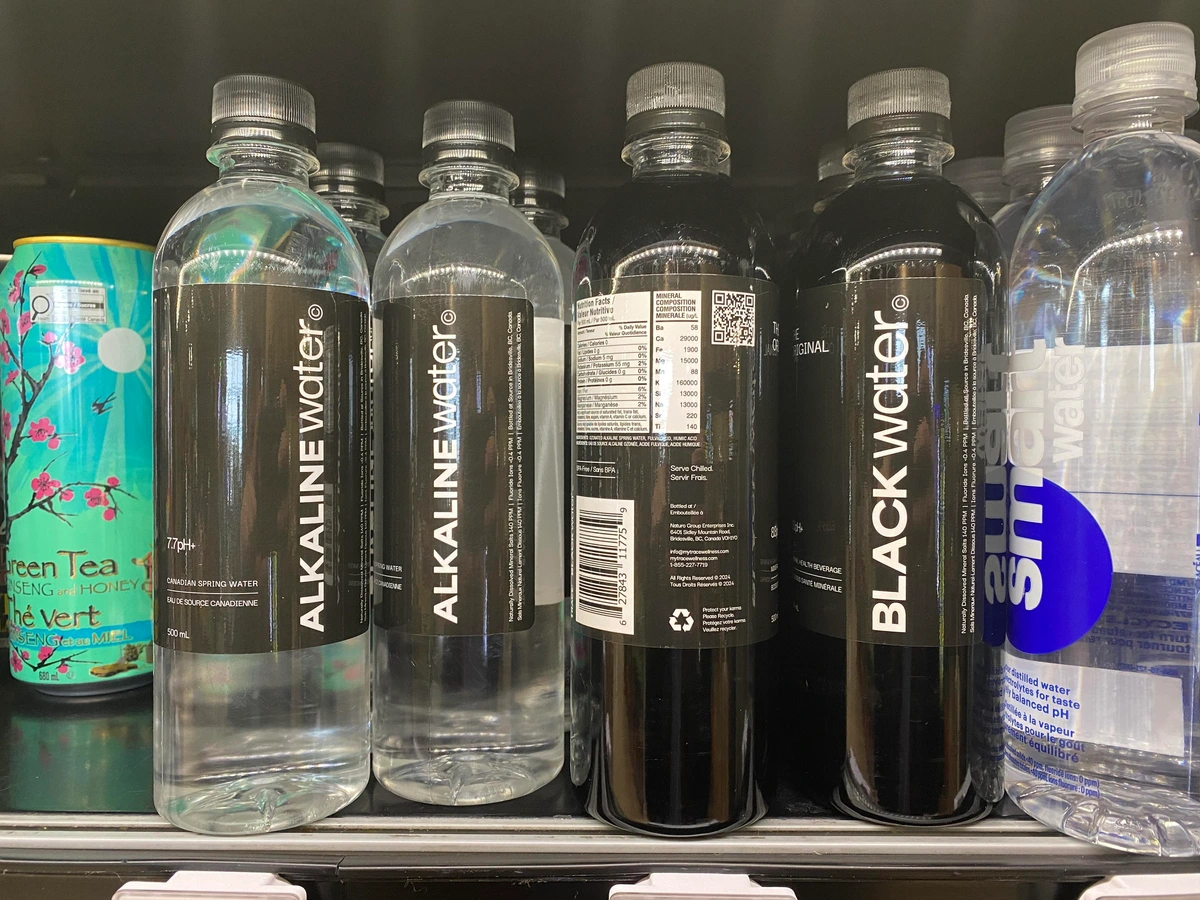 Bottled drinks for sale at the grocery store. Smart water, Alkaline water, green tea, but in the middle: a drink called "black water".

One of those "if you know you know" things.