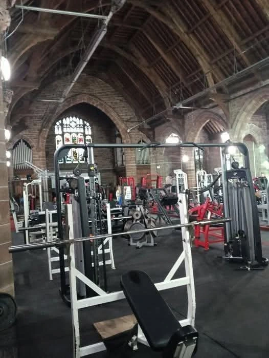 Photo of a church interior set up as a gym.